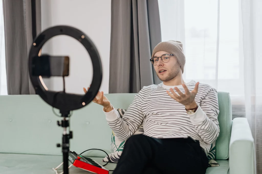 A man vlogging